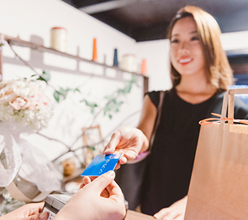 Woman paying with a card